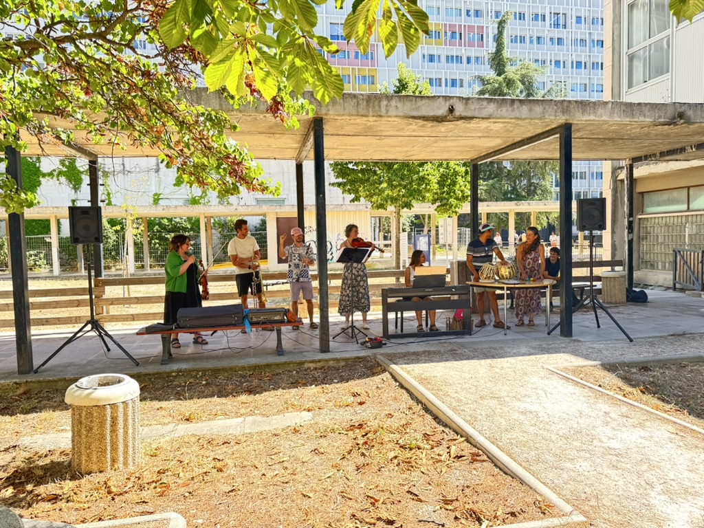 A wider view of the concert under the pergola